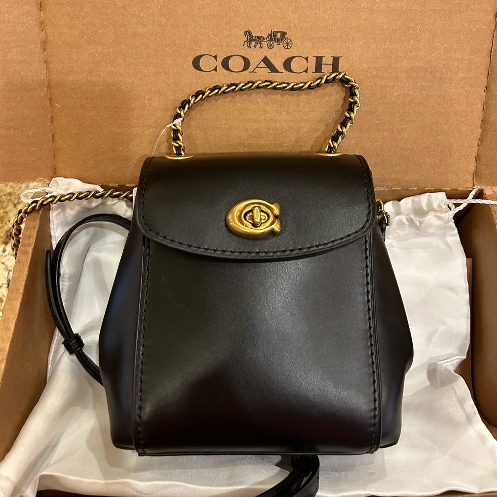 Brand new, unused black Coach backpack with dust bag & original Coach box